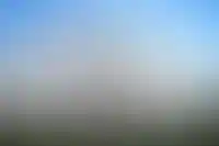 Стена Ростовского кремля, за ней — Успенский собор