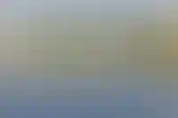 Вид на катер на реке Великой и Псковский кремль